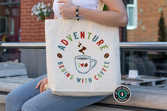 Adventure Begins With Coffee SVG Design for Crafters on a tote bag