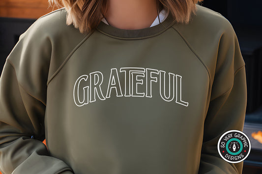 Grateful SVG Design on a Green Sweatshirt