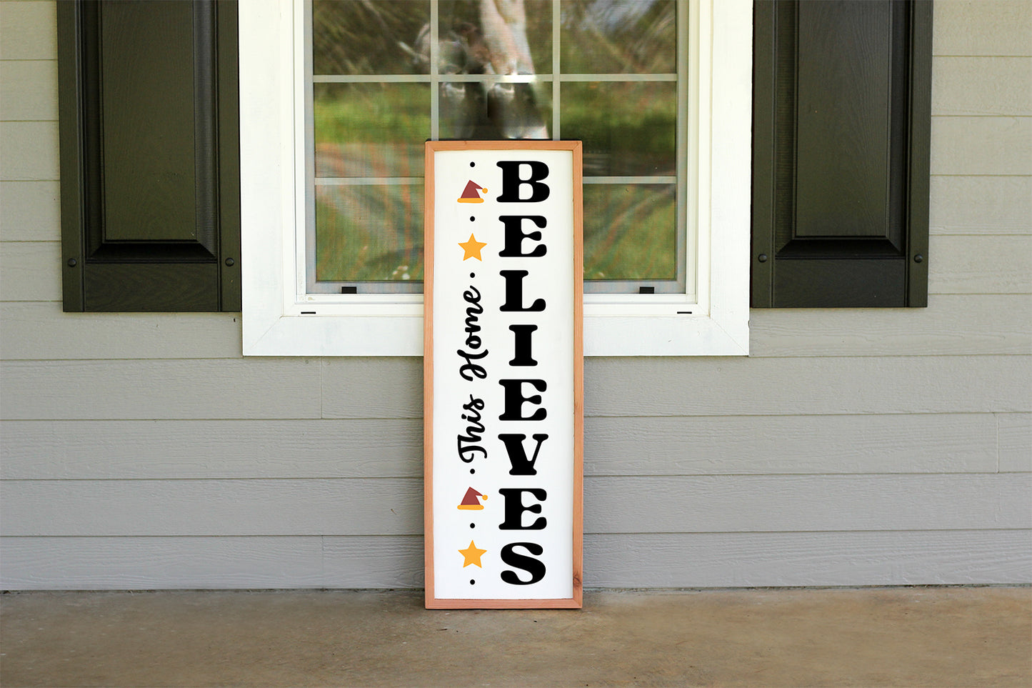 This Home Believes Farmhouse Christmas Vertical Porch Sign SVG Cut File for Cricut, Silhouette, Brother Scan N Cut machines.