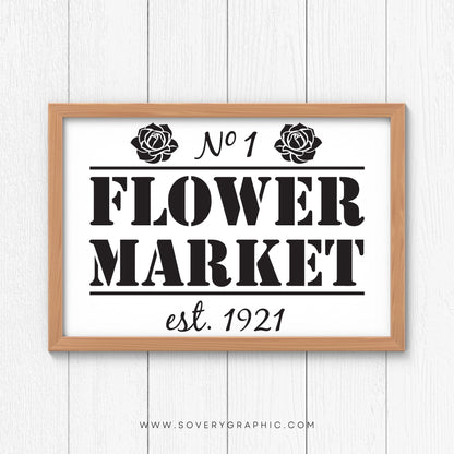 Flower Market Sign hanging on a wood paneled wall